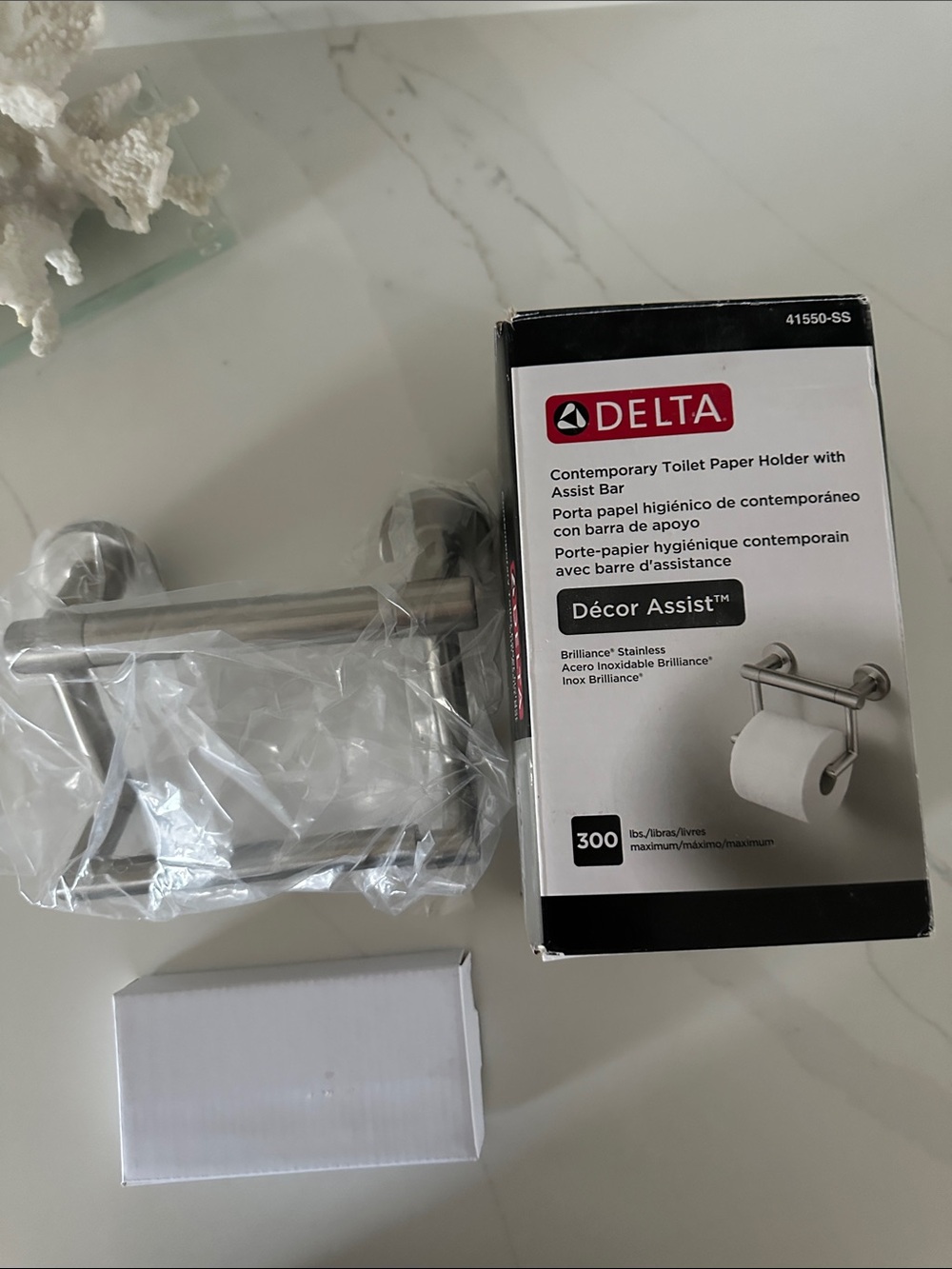 Delta Brushed Stainless Steel Toilet Paper Holder with Assist Bar. New in box.